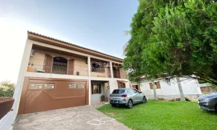 Casa com 4 quartos à venda na avenida do nazario, 513, olaria, canoas por r$ 998.000