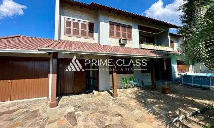 Casa com 5 quartos à venda na Rua Ney Brito, 140, Nossa Senhora das Graças, Canoas por R$ 897.000