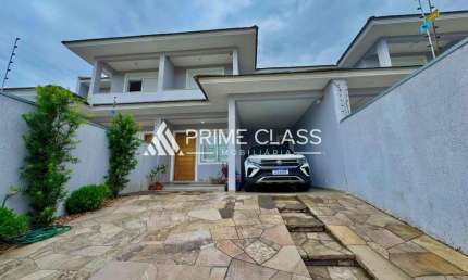 Casa com 3 quartos à venda na Remi Ferazzo, 27, São José, Canoas por R$ 1.099.000