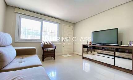 Casa com 2 quartos à venda na Rua Irani Bertelli, 199, Nossa Senhora das Graças, Canoas por R$ 479.000