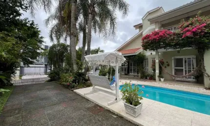 Casa com 5 quartos à venda na rua país de gales, 41, moinhos de vento, canoas por r$ 2.499.000