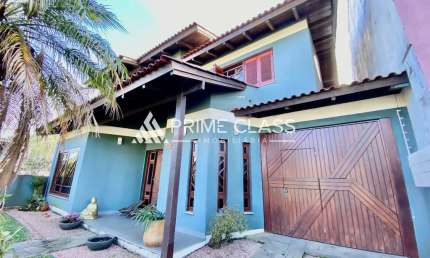 Casa com 4 quartos à venda na Rua Tenente Antônio João, 228, Loteamento Bela Vista, Canoas por R$ 1.350.000
