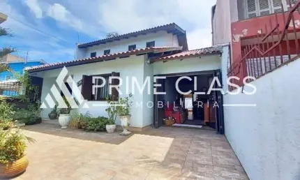 Casa com 3 quartos à venda na Rua Lynx, 216, Moinhos De Vento, Canoas por R$ 690.000