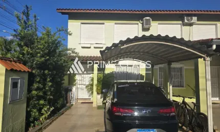 Casa em condomínio fechado com 3 quartos à venda na Rua Henrique Stefani, 801, Igara, Canoas por R$ 478.000