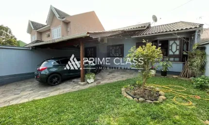 Casa com 3 quartos à venda na Rua Orion, 318, Moinhos De Vento, Canoas por R$ 700.000