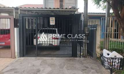 Casa em condomínio fechado com 3 quartos à venda na Rua Waldemar Silva de Souza, 85, São José, Canoas por R$ 371.000