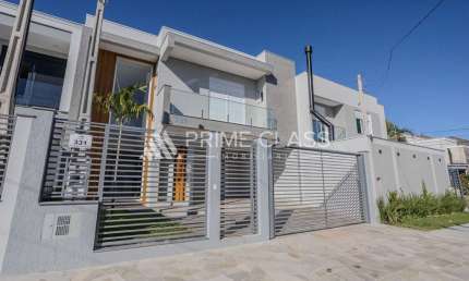 Casa com 3 quartos à venda na Rua Ulysses Gomes Ferreira, 331, Mont Serrat, Canoas por R$ 1.680.000