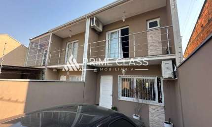 Casa com 2 quartos à venda na Rua Irani Bertelli, 197, Nossa Senhora das Graças, Canoas por R$ 470.000