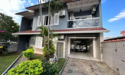 Casa com 4 quartos à venda na rua quinze de novembro, 181, nossa senhora das graças, canoas por r$ 1.380.000