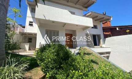 Casa com 4 quartos à venda na Rua Irmão Adão Rui, 401, Jardim do Lago, Canoas por R$ 2.100.000