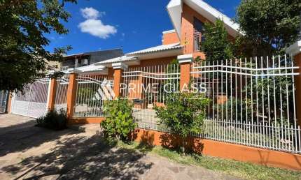 Casa com 5 quartos à venda na Rua Escócia, 29, Marechal Rondon, Canoas por R$ 2.700.000
