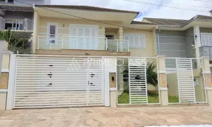 Casa com 4 quartos à venda na rua taurus, 277, loteamento bela vista, canoas por r$ 1.400.000
