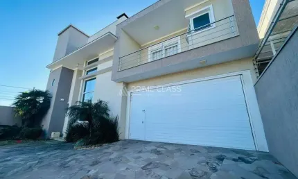 Casa com 3 quartos à venda na rua das canafístulas, 204, igara, canoas por r$ 950.000