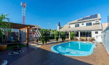 Casa com 3 quartos à venda na Avenida Açucena, 1334, Loteamento Bela Vista, Canoas por R$ 2.120.000