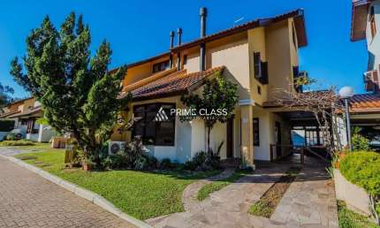 Casa em condomínio fechado com 4 quartos à venda na Rua Duque de Caxias, 1012, Marechal Rondon, Canoas por R$ 1.650.000