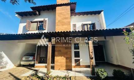 Casa com 4 quartos à venda na Rua Irmão Guilherme, 225, Marechal Rondon, Canoas por R$ 1.275.000