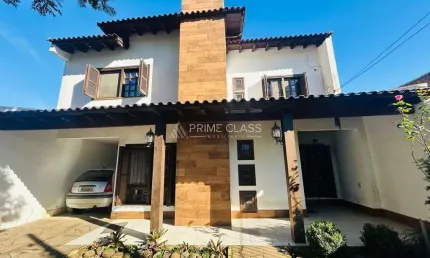 Casa com 4 quartos à venda na rua irmão guilherme, 225, marechal rondon, canoas por r$ 1.275.000