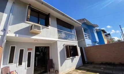 Casa com 3 quartos à venda na Elis Regina, 102, Pitangueiras, Canoas por R$ 444.900