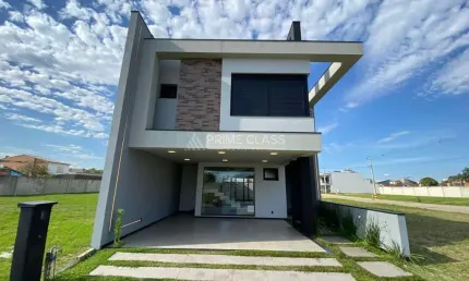 Casa em condomínio fechado com 3 quartos à venda na rua cairu, 444, rio branco, canoas por r$ 1.600.000