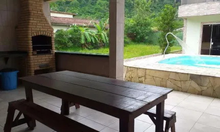 CASA 4 DORMITÓRIOS 4 SUÍTES CHURRASQUEIRA PISCINA 4 VAGAS DE GARAGEM