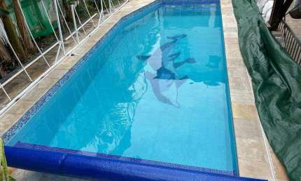 CASA 4 DORMITÓRIOS 3 SUÍTES 6 VAGAS DE GARAGEM PISCINA AQUECIDA QUINTAL
