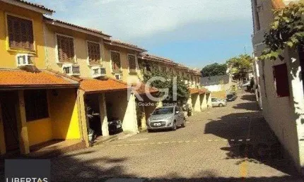 Casa em condomínio no partenon de 3 dormitórios e vaga