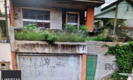 Casa com 3 quartos à venda na Avenida Coronel Gastão Haslocher Mazeron, 447, Medianeira, Porto Alegre