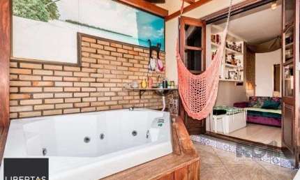Casa em condomínio fechado com 3 quartos para alugar na Avenida Karl Iwers, 252, Jardim Itu Sabará, Porto Alegre
