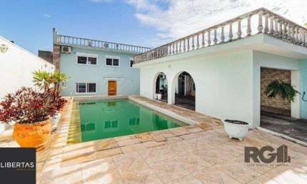 Casa 4 dormitórios à venda Chácara das Pedras Porto Alegre/RS