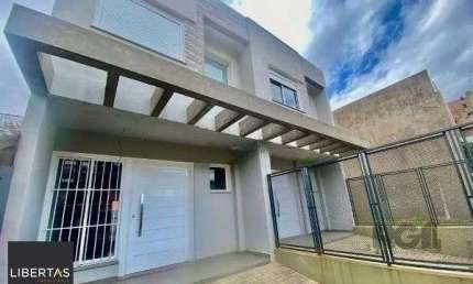 Casa com 3 quartos para alugar na Rua Doutor Cláudio Walter Ferreira da Silva, 251, Guarujá, Porto Alegre