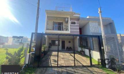Casa com 3 quartos para alugar na Rua Eroni Soares Machado, 93, Hípica, Porto Alegre