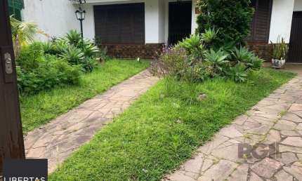 Casa com 3 quartos à venda na Rua Mura, 60, Guarujá, Porto Alegre