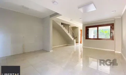 Casa com 3 quartos à venda na Rua Ronaldo Molina de Quadros, 420, Mário Quintana, Porto Alegre