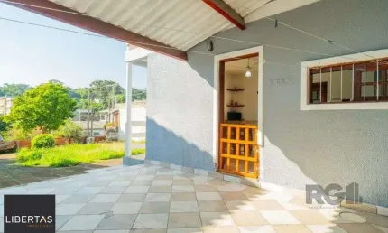 Casa com 3 quartos à venda na Rua Mathilde Zatar, 87, Nonoai, Porto Alegre