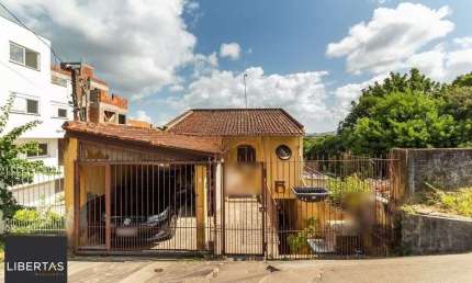 Casa com 4 quartos à venda na Rua Padre João Batista Reus, 2778, Camaquã, Porto Alegre