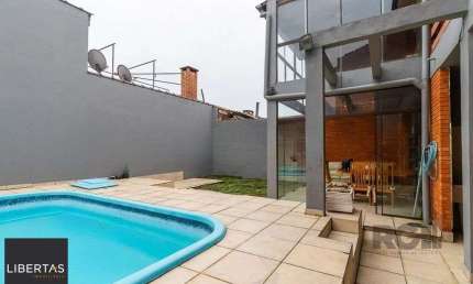 Casa com 5 quartos à venda na Travessa Von Salisch, 90, Sarandi, Porto Alegre