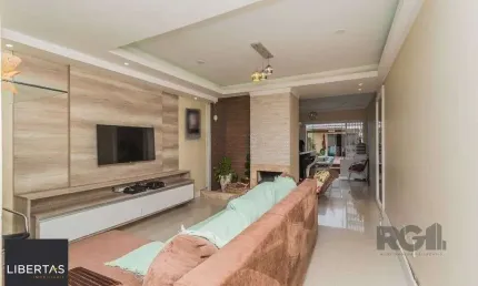 Casa com 3 quartos à venda na Rua Danton Krás Borges, 53, Guarujá, Porto Alegre