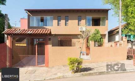 Casa com 4 quartos à venda na Rua Adroaldo Novo Correa, 126, Cavalhada, Porto Alegre