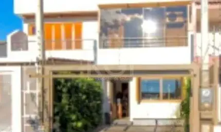 Casa com 3 quartos à venda na Rua Waldemar da Silva Tavares, 234, Guarujá, Porto Alegre