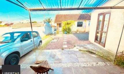 Casa com 4 quartos à venda na Rua Padre João Batista Reus, 3220, Camaquã, Porto Alegre