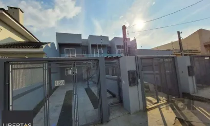Sobrado com 3 dormitórios, suíte e duas vagas de garagem no bairro Sarandi