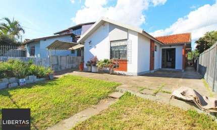 Casa com 5 quartos à venda na Rua João Mora, 258, Camaquã, Porto Alegre