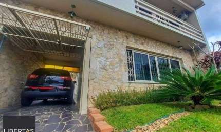 Excelente casa com 3 dormitórios e 3 vagas de garagem