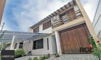 Casa de 285m² - 4 dormitórios, 4 vagas no bairro Bom Jesus