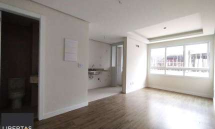 APARTAMENTO 1 DORMITÓRIO COM SUÍTE, COZINHA AMERICANA, LAVABO E AMPLO LIVING NO