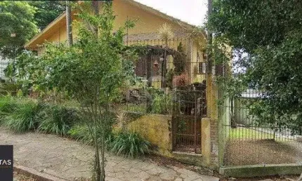 Casa 4 dormitórios à venda Parque Santa Fé Porto Alegre/RS