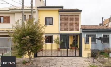 Casa com 3 quartos à venda na Rua Eva Pinto, 114, Hípica, Porto Alegre