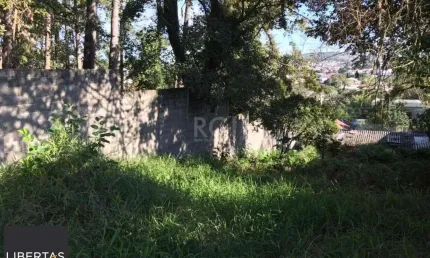 Terreno à venda na Avenida Vicente Monteggia, 784, Cavalhada, Porto Alegre