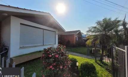 Casa 4 dormitórios para alugar Três Figueiras Porto Alegre/RS