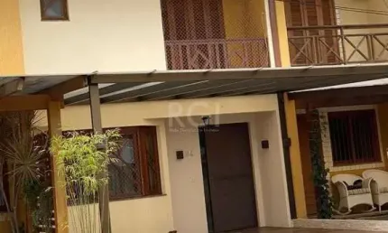 Casa com 3 quartos à venda na Avenida Edgar Pires de Castro, 1286, Hípica, Porto Alegre